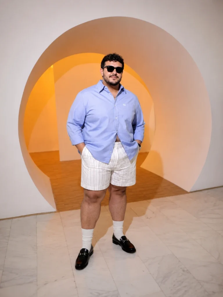 13. Blue Shirt with Striped Shorts and Black Loafers
