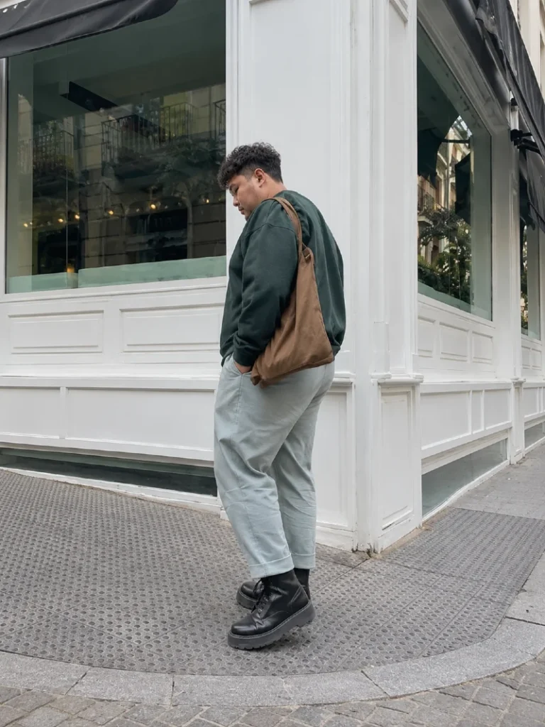 14. Green Sweatshirt, Cropped Pants, and Black Lug Boots