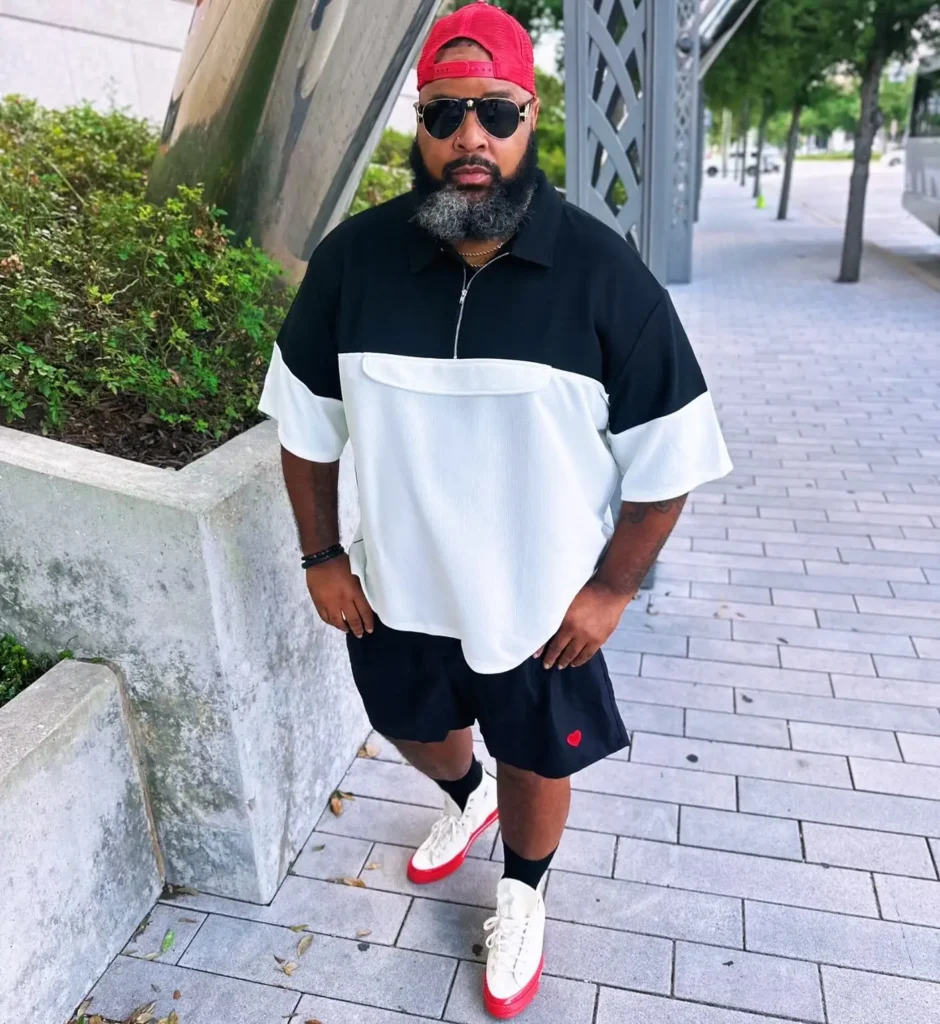 15. Color-Block Half-Zip Tee With Black Shorts