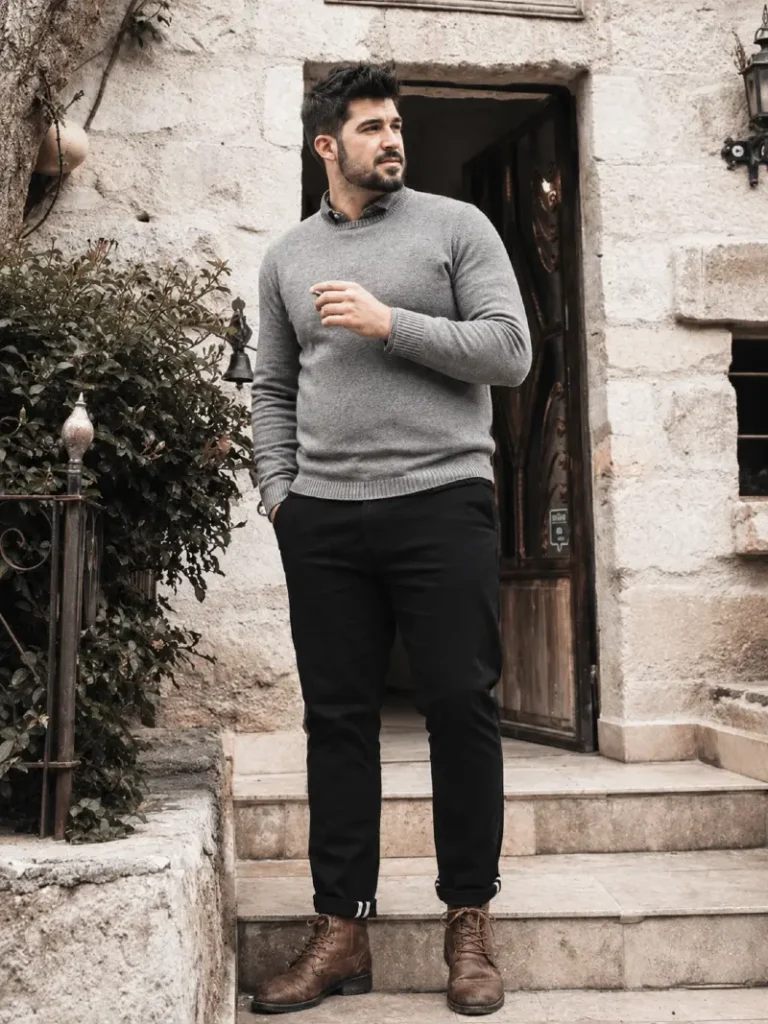 18. Gray Sweater With Black Pants and Brown Lace-Up Boots