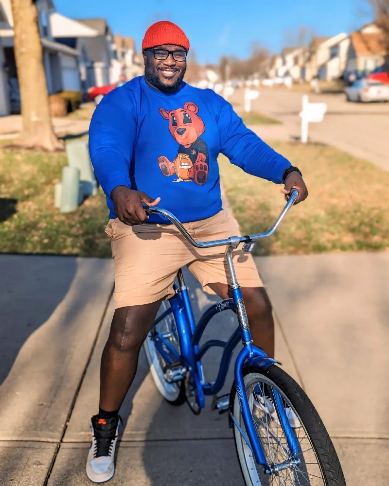 4. Bright Graphic Sweatshirt With Khaki Shorts