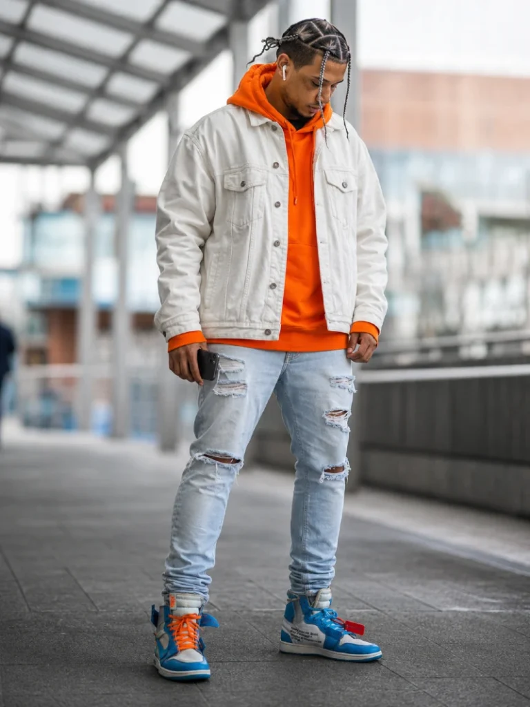 5. Orange Hoodie Under an Off-White Denim Jacket