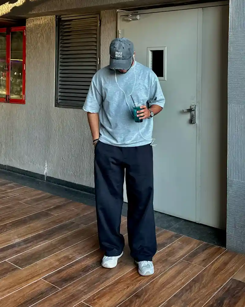 Baseball Cap, T-Shirt, and Wide-Leg Trousers