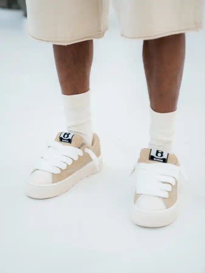 Beige Shorts and Tan Skate Sneakers