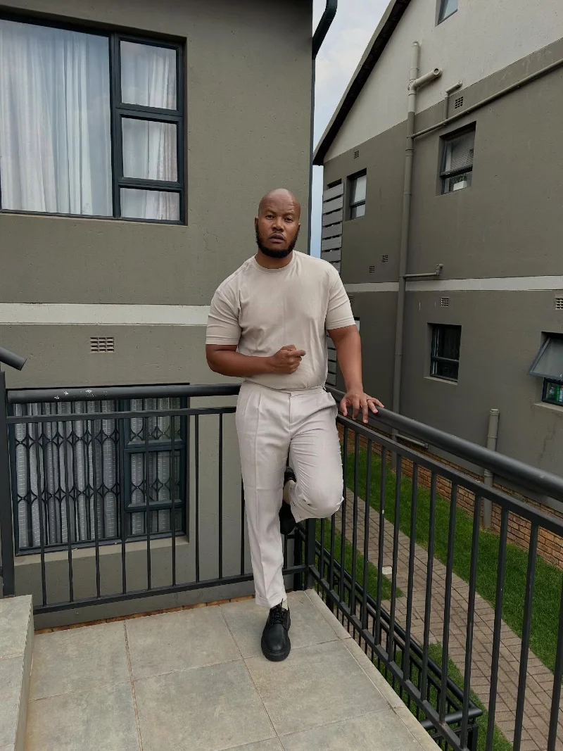 Beige T-Shirt and Pleated Trousers