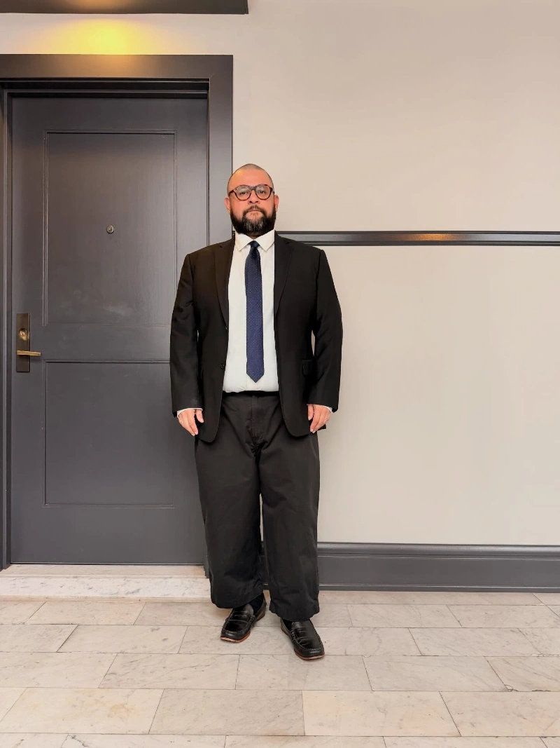 Black Blazer, Crisp White Shirt, Navy Tie, and Dark Trousers