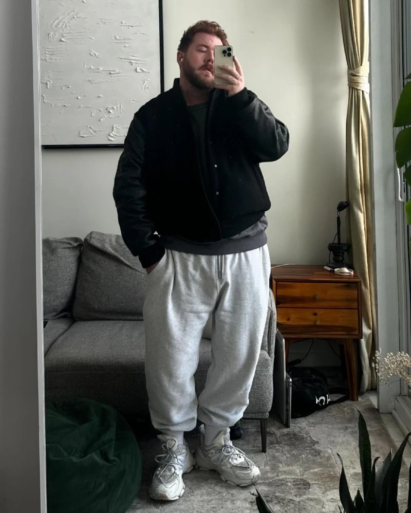 Black Bomber Jacket and Light Grey Sweatpants