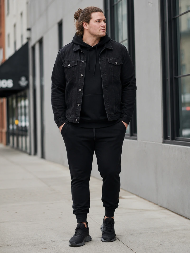 Black Denim Jacket, Black Hoodie, Black Sweatpants, and Black Sneakers
