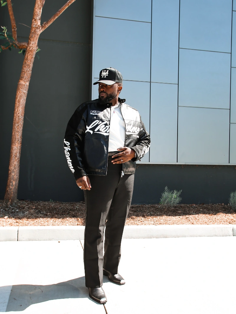 Black Graphic Jacket, White T Shirt, Black Trousers and Black Boots