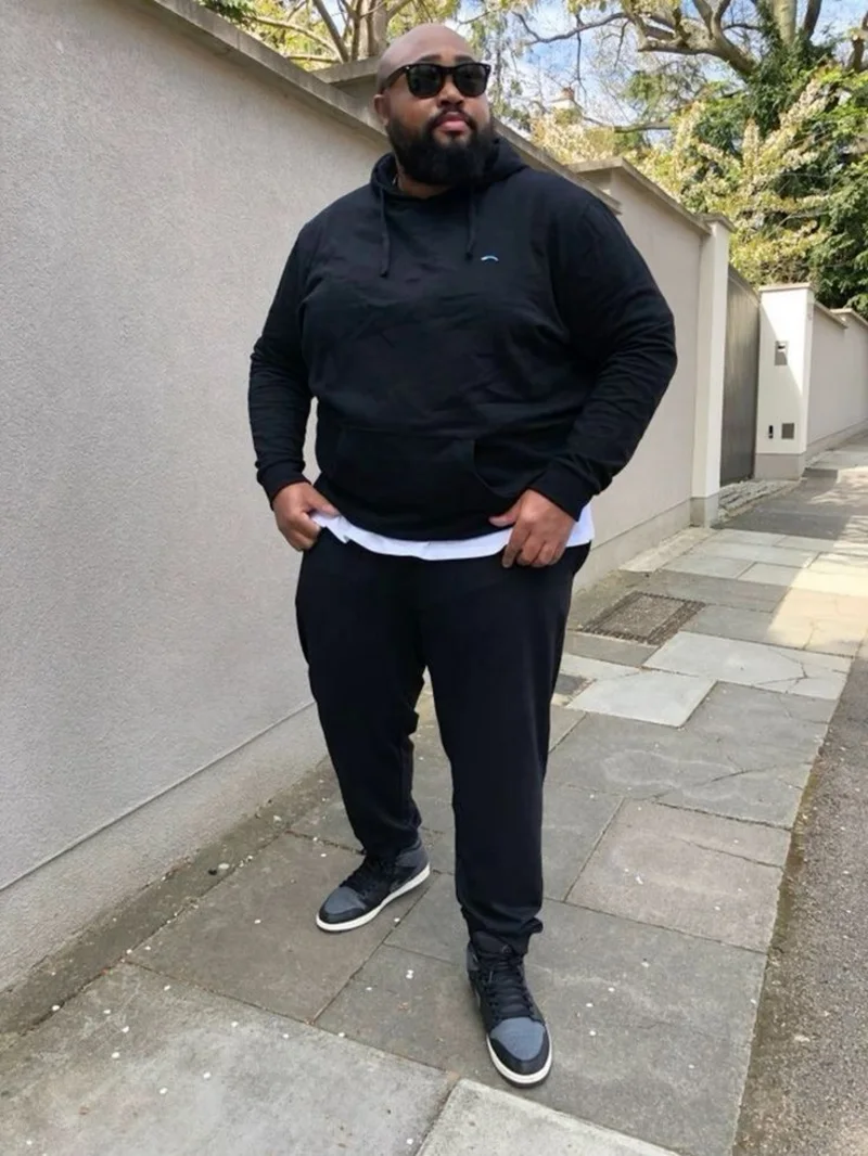 Black Hoodie With Black Joggers and High-Top Sneakers