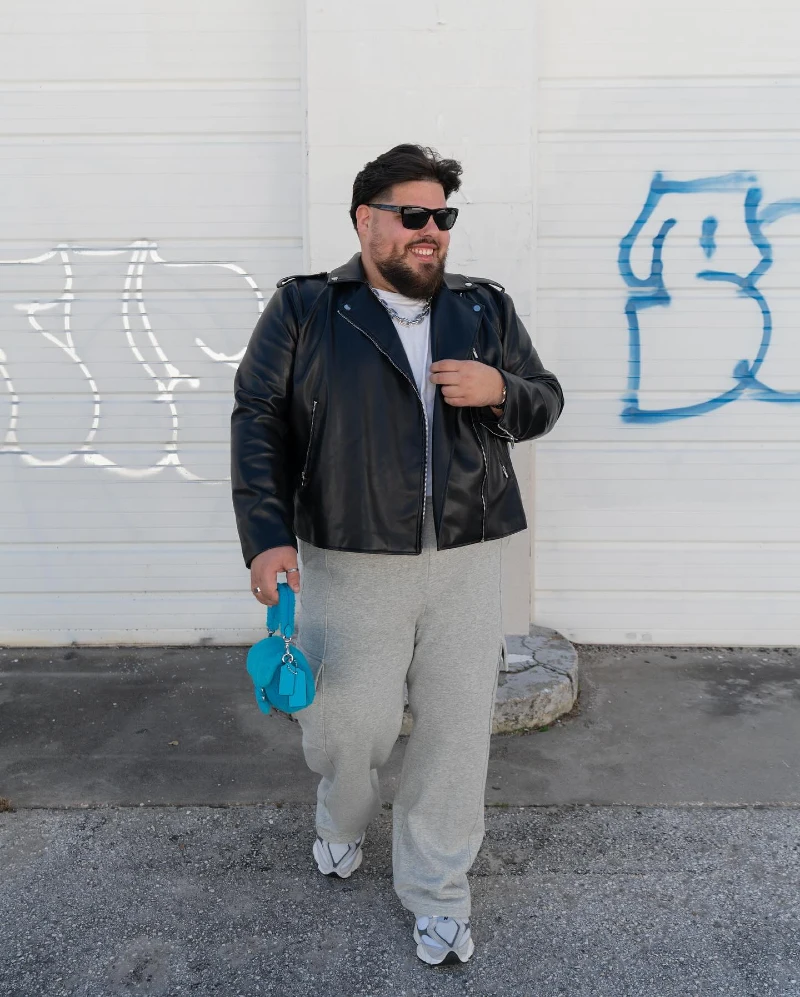 Black Leather Jacket With Relaxed Gray Sweatpants