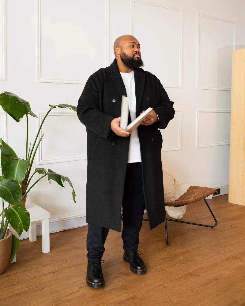 Black Overcoat, White T Shirt, Dark Trousers and Black Lace Up Boots