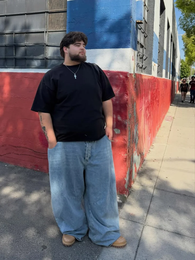 Black Oversized T-Shirt, Light-Wash Baggy Jeans, and Tan Chunky Shoes