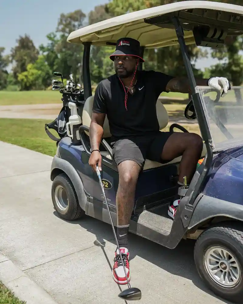 Black Polo and Shorts with Bold Accents