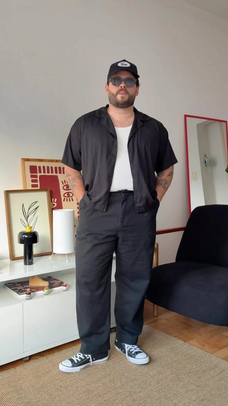 Black Short-Sleeve Button-Down Shirt, White Tank Top, Black Trousers, and Black Canvas Sneakers