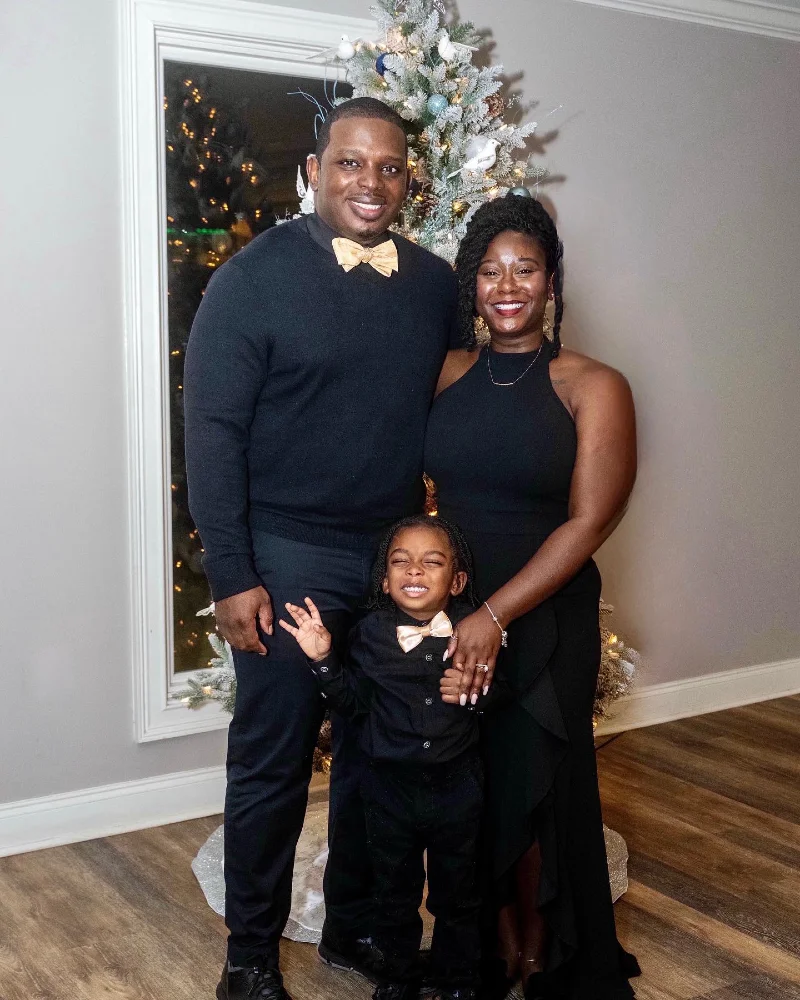 Black Sweater and Gold Bow Tie