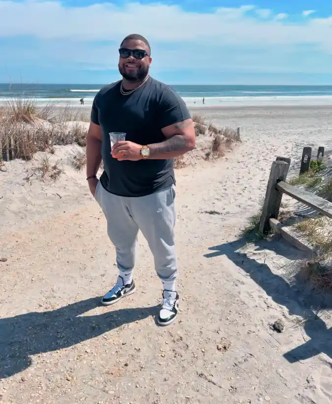Black T-Shirt and Grey Sweatpants