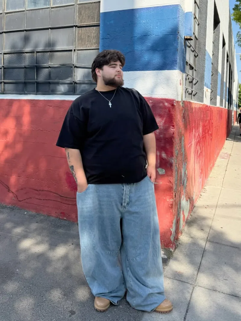 Black T-Shirt and Ultra-Wide Light Wash Jeans