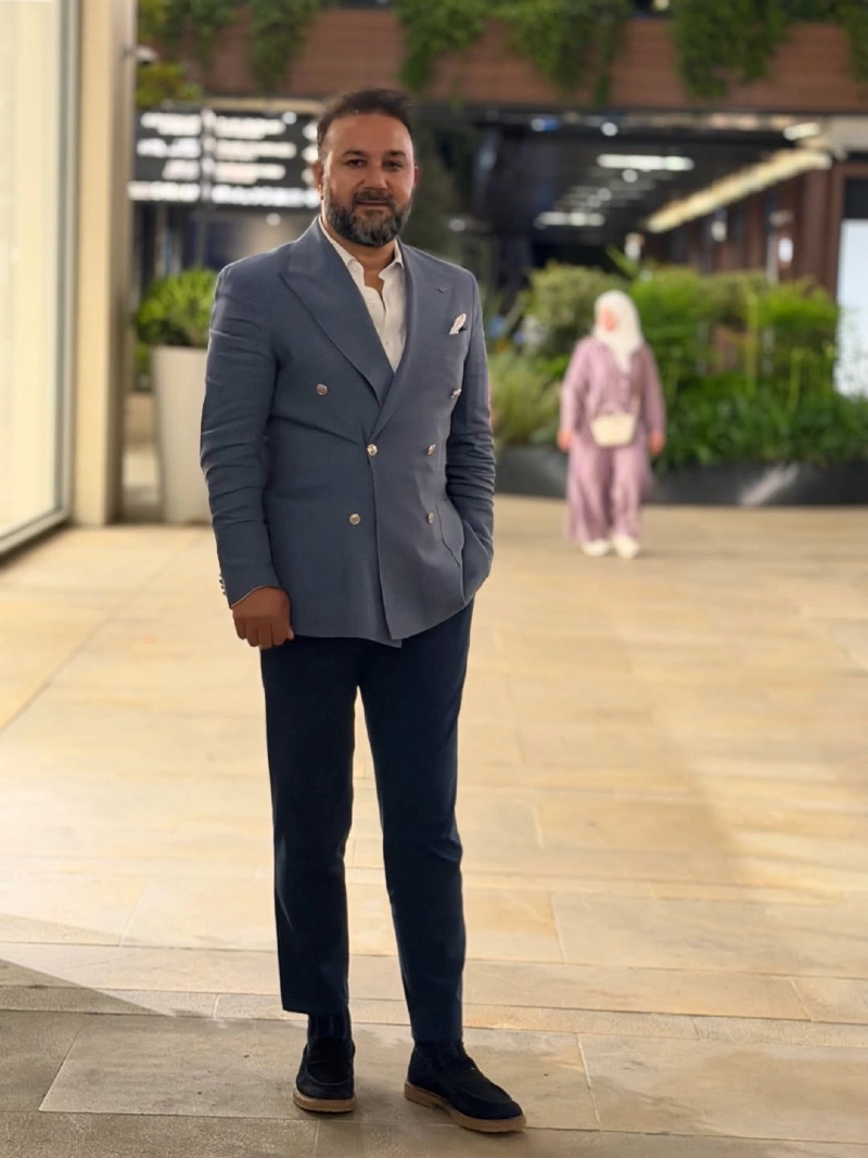 Blue Double-Breasted Blazer and Dark Pants