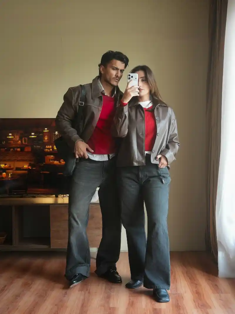 Brown Leather Jacket, Red Sweater, and Dark Grey Jeans