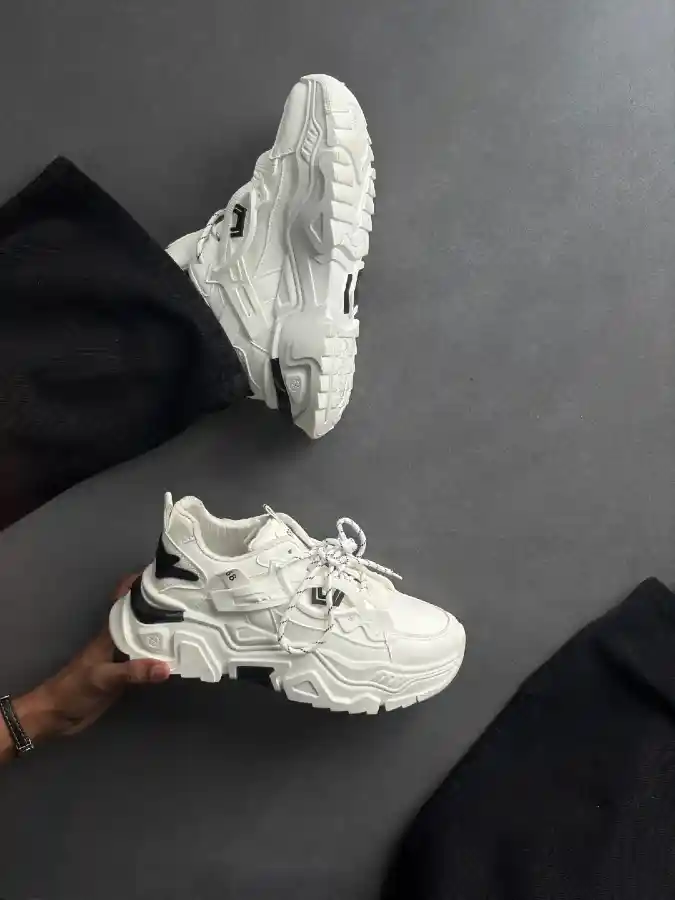 Chunky White Sneakers and Black Trousers
