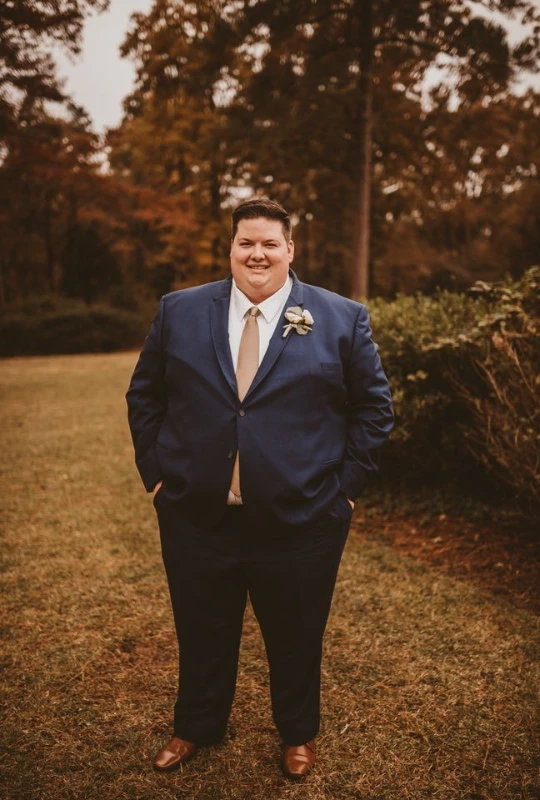 Classic Navy Suit With Champagne Tie