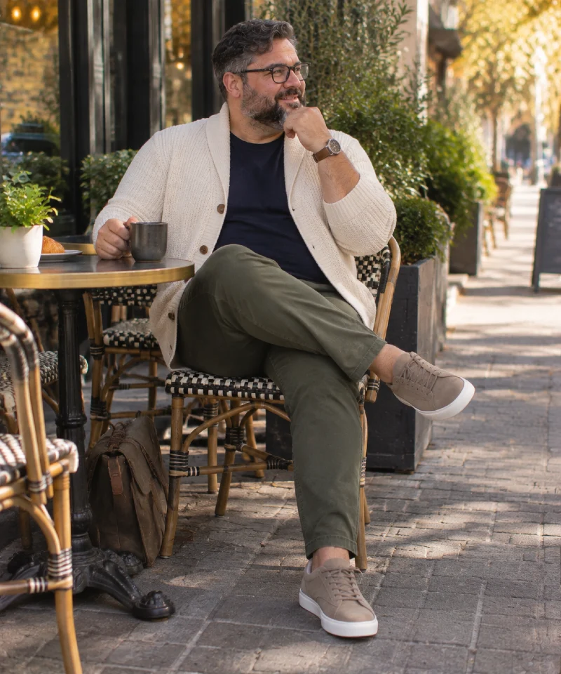 Cream Cardigan with Black T-Shirt, Olive Pants, and Beige Sneakers