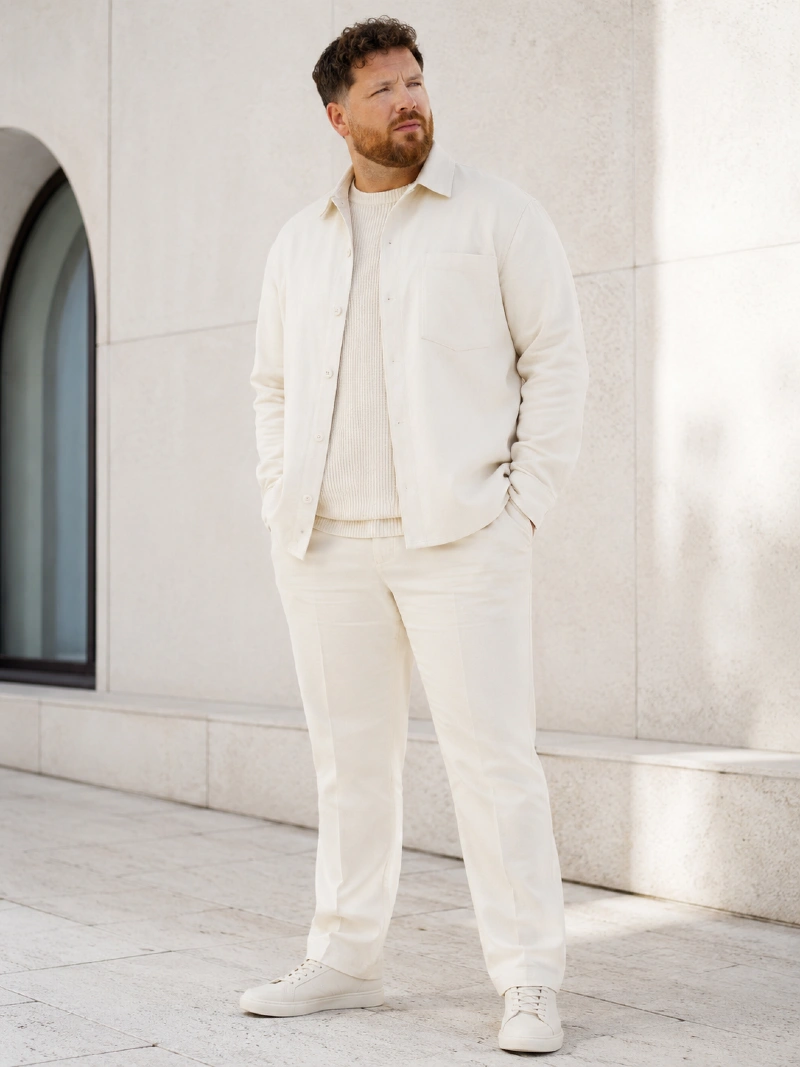Cream Overshirt, Ribbed Sweater, and Trousers