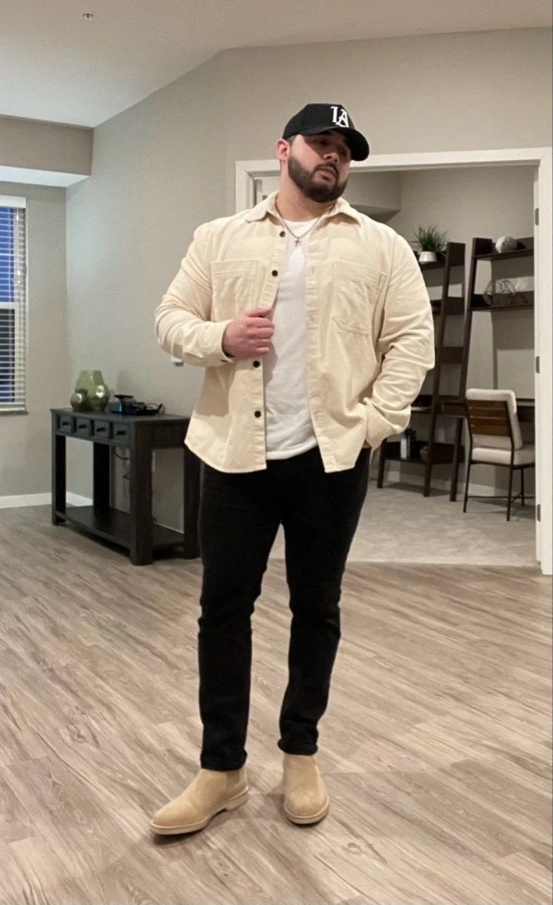 Cream Shirt Jacket, White T-Shirt, Black Pants, and Beige Boots