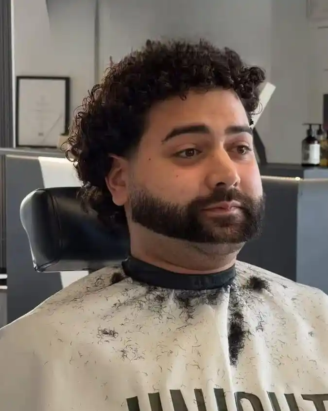 Curly Mullet with a Taper Fade