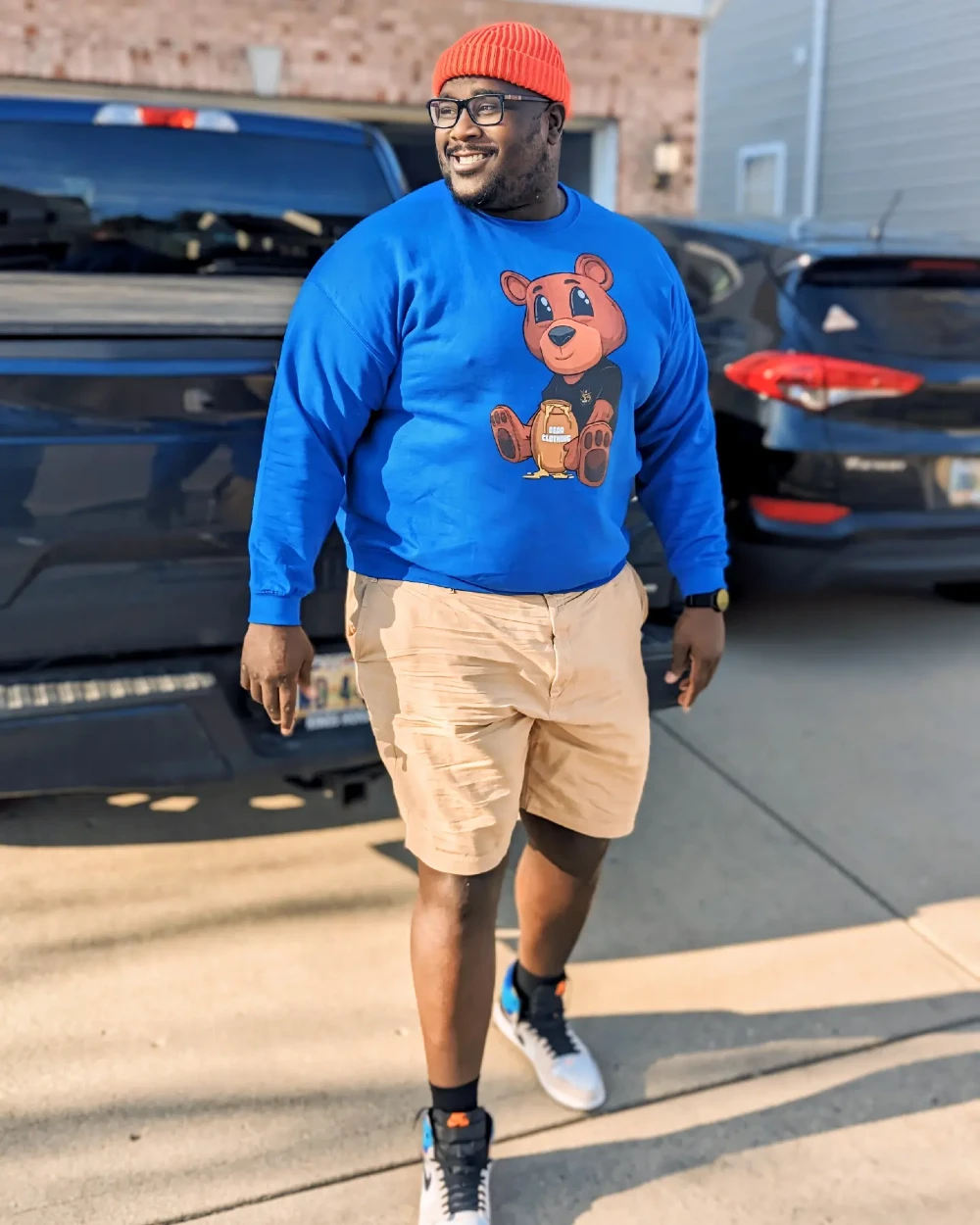 Graphic Sweatshirt and Khaki Shorts