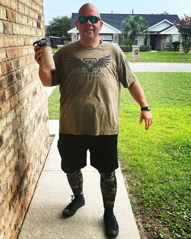 Graphic T-Shirt, Athletic Shorts, and Camouflage Leggings