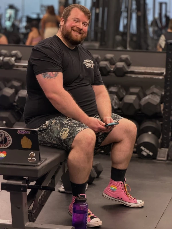 Graphic T-Shirt, Patterned Shorts, and High-Top Sneakers