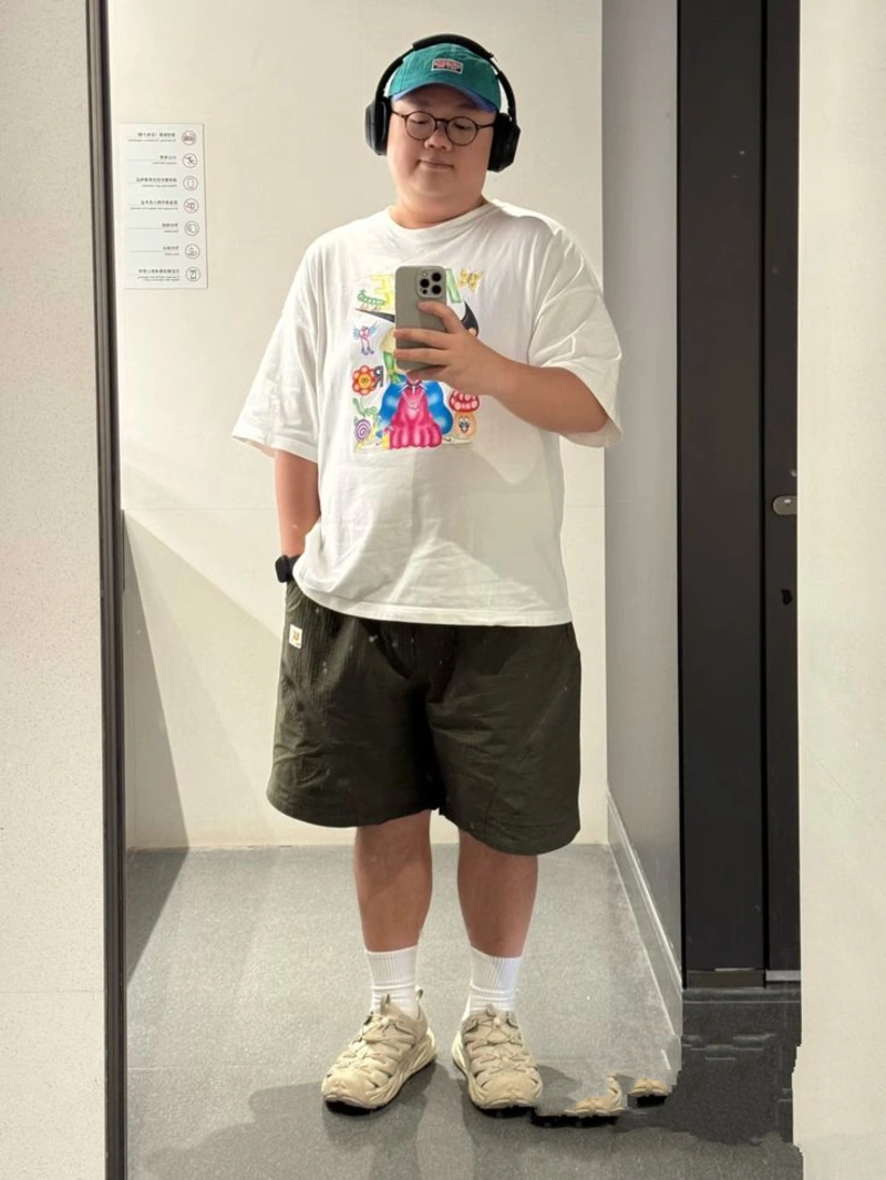 Graphic T-Shirt and Dark Olive Shorts