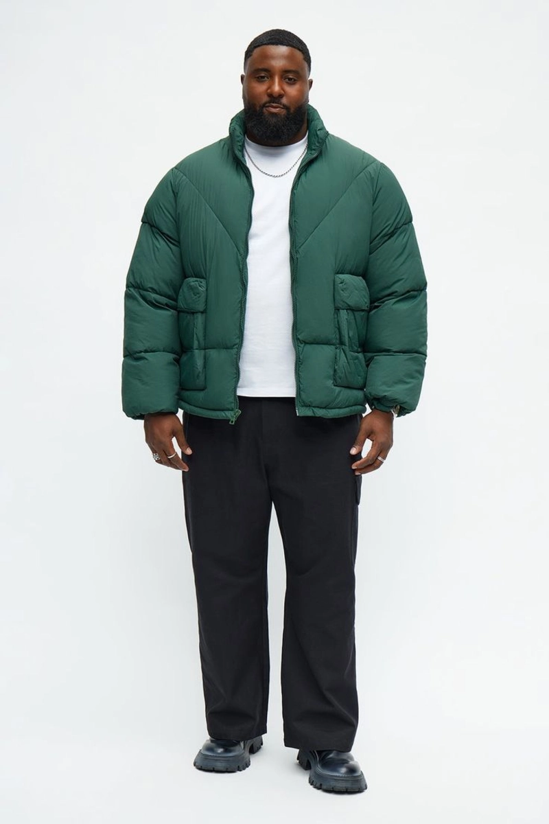 Green Puffer Jacket with White T-Shirt and Black Pants
