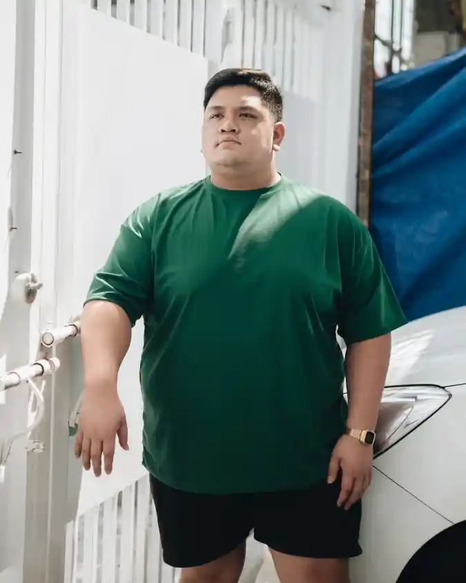 Green T-Shirt and Black Shorts