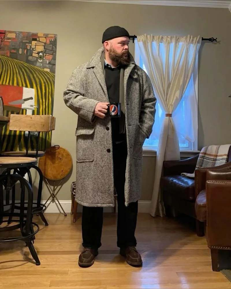 Herringbone Pattern Overcoat with Sweater and Dark Trousers