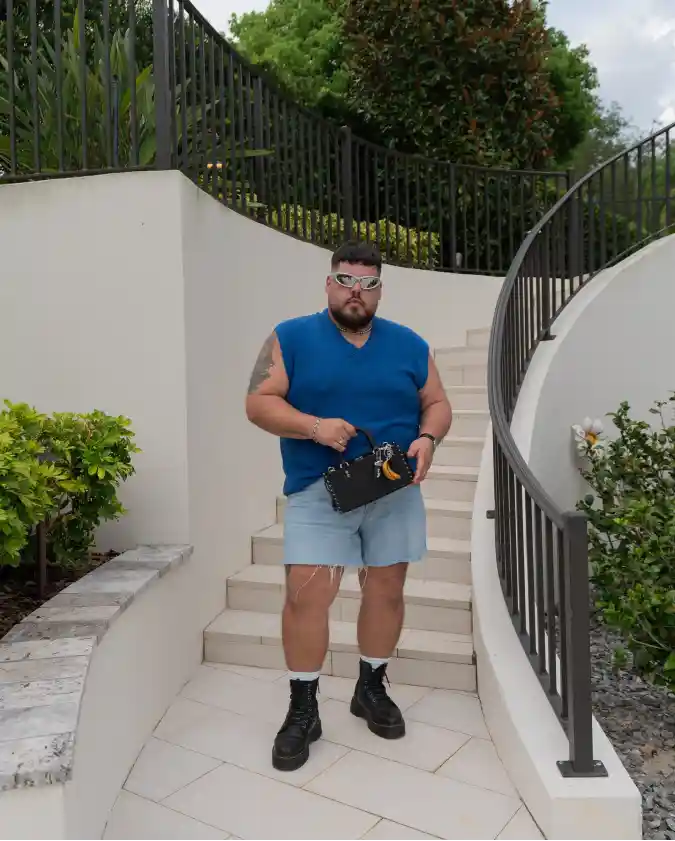 Knit Vest and Raw-Edge Denim Shorts