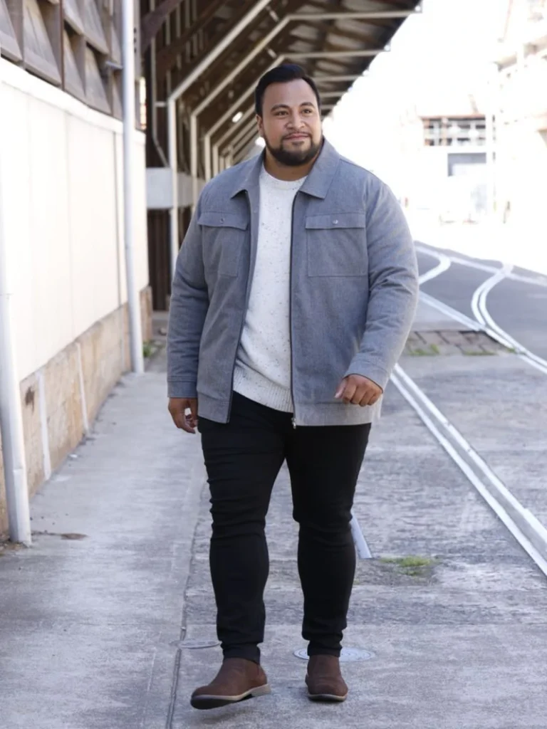 Layered Grey Jackets Over Speckled Knitwear