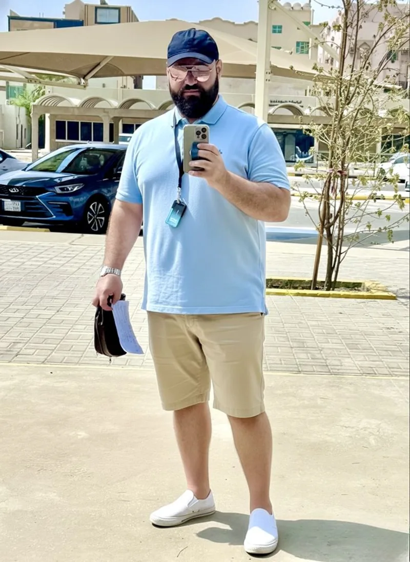 Light Blue Polo Shirt, Khaki Shorts, and Navy Baseball Cap