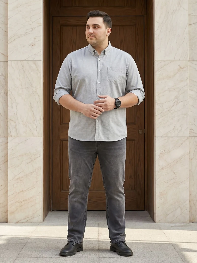 Light Gray Button-Down Shirt with Dark Gray Jeans and Black Boots