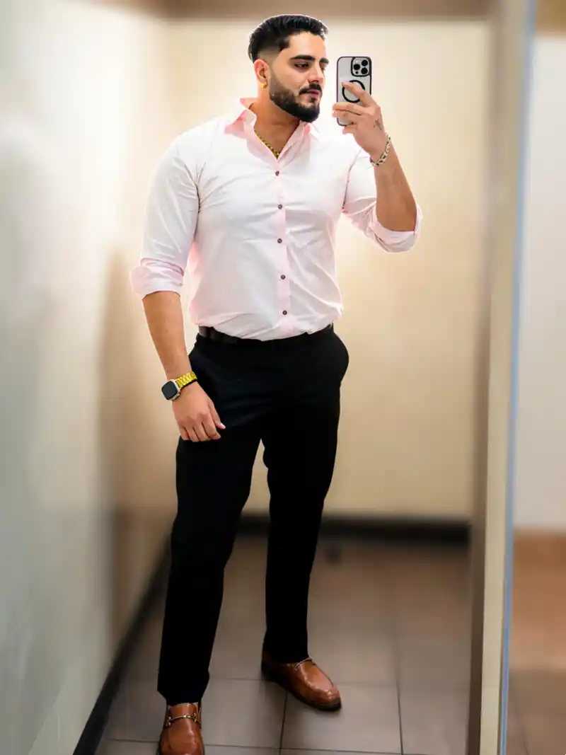 Light Pink Button-Down Shirt and Black Trousers