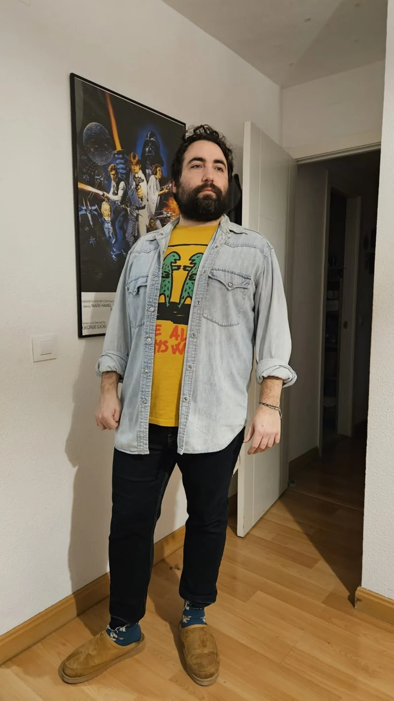 Light Wash Denim Shirt, Yellow Graphic T-Shirt, Dark Jeans, and Tan Suede Mules