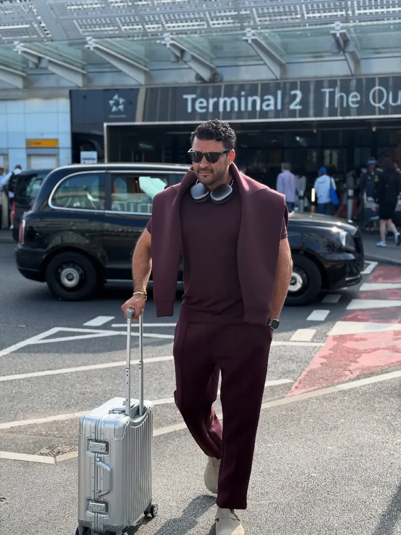 Monochromatic Maroon Tracksuit and Layered Sweater