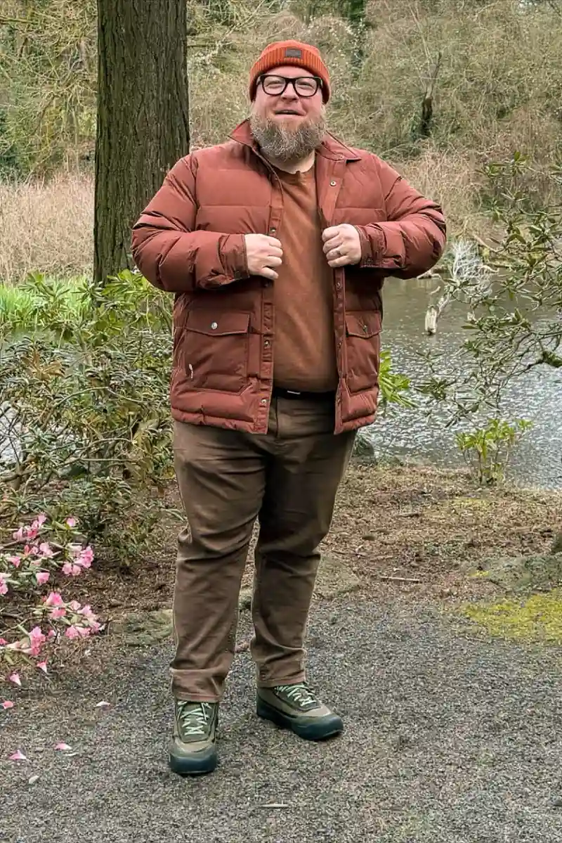 Monochromatic Rust-Orange Puffer Jacket and Brown Pants Outfit