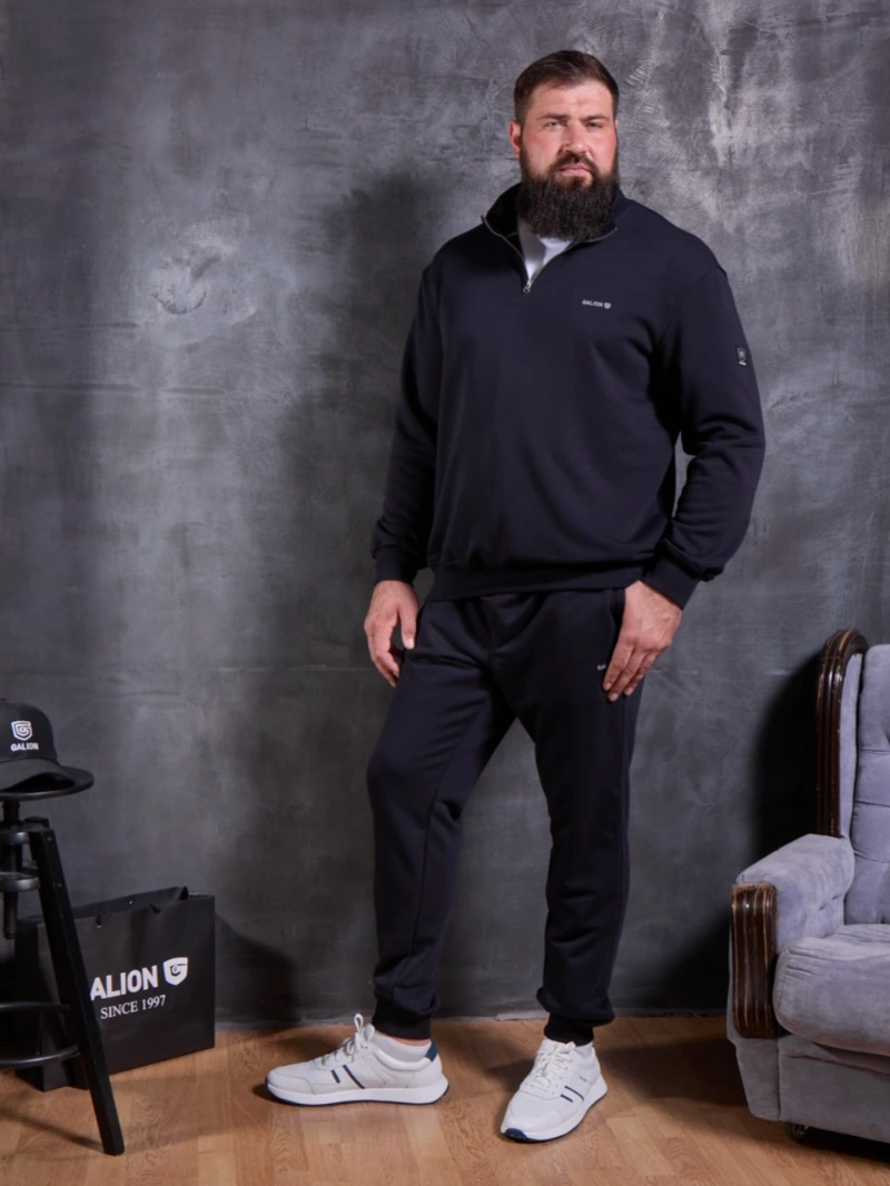 Navy Quarter-Zip Sweatshirt, Navy Joggers, and White Sneakers