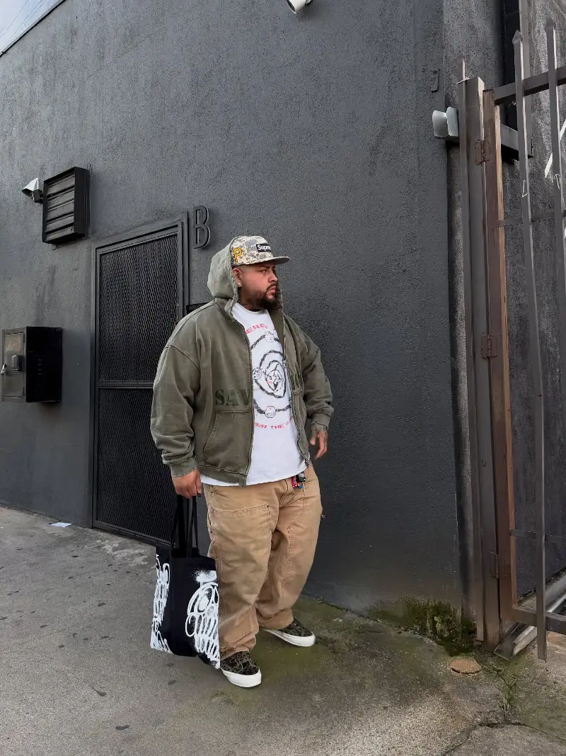 Olive Zip Hoodie With Tan Work Pants and Printed Sneakers