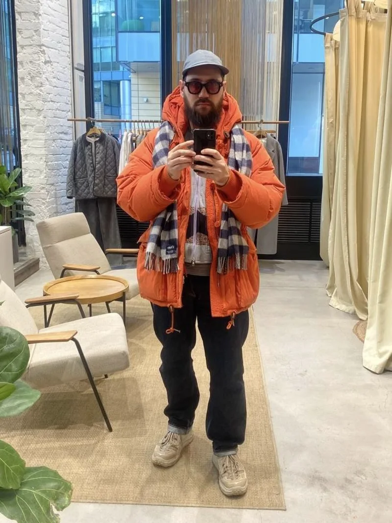 Orange Puffer Jacket With Dark Jeans