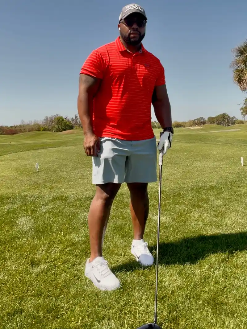Red Striped Polo and Grey Shorts