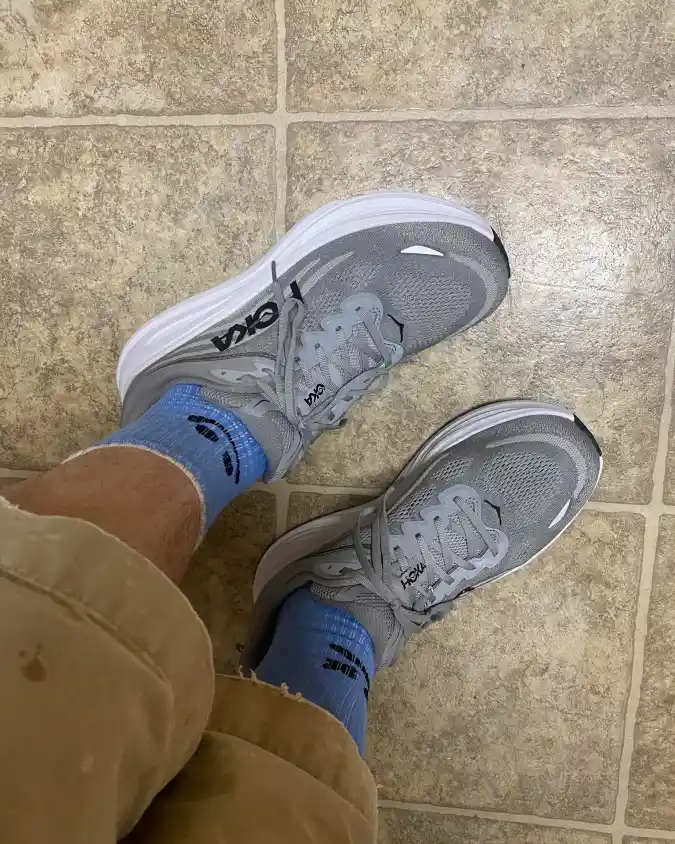 Running Shoes, Light Blue Socks, and Tan Shorts